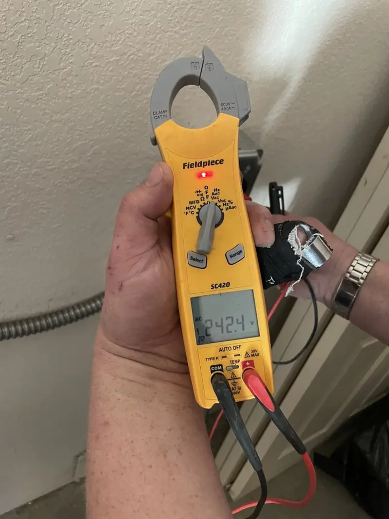 Voltage testing with clamp meter during Generator Installation in Thornbury